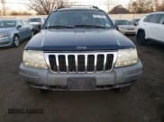✅ 2001 Jeep Grand Cherokee Laredo • VIN: 1J4GW48S21C620739 • Lot: 93217225. Wystawiony na Copart z przebiegiem 143 157 mil. Bezpłatny archiwum sprzedaży aukcyjnych z USA i szczegółowy raport historii pojazdu na DreamBid. Zdjęcie 5.