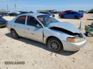 ✅ 2001 Ford Escort Fleet • VIN: 3FAFP13P21R186197 • Lot: 58561085. Listed on Copart with 197,939 mi. Free auction sales archive from the USA and detailed vehicle history report at DreamBid. Image 4.