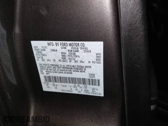 2006 Mercury Mariner Luxury z VIN 4M2CU56126KJ03006, wystawiony jako IAAI lot #42476543 z przebiegiem 114 288 mil mil oraz . Historia ofert i sprzedaży dostępna na DreamBid. Obrazek 9.