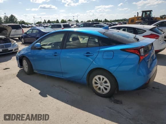 ✅ 2021 Toyota Prius L Eco • VIN: JTDKAMFU8M3137070 • Lot: 61420855. Wystawiony na Copart z przebiegiem 51 585 mil. Bezpłatny archiwum sprzedaży aukcyjnych z USA i szczegółowy raport historii pojazdu na DreamBid. Zdjęcie 2.