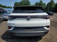 ✅ 2023 Volkswagen ID.4 Pro • VIN: 1V2DNPE89PC042636 • Лот: 67781985. Опубликован ранее на Copart с пробегом 14 866 миль. Бесплатный доступ к архиву аукционных продаж из США и подробный отчёт об истории автомобиля на DreamBid. Изображение 6.