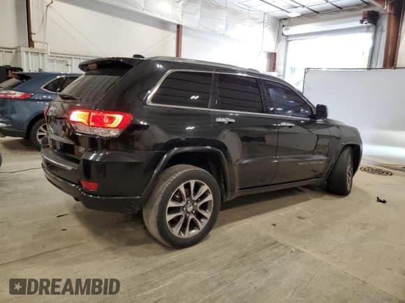✅ 2018 Jeep Grand Cherokee Overland • VIN: 1C4RJECG0JC428581 • Лот: 64009575. Опубликован ранее на Copart с пробегом 130 337 миль. Бесплатный доступ к архиву аукционных продаж из США и подробный отчёт об истории автомобиля на DreamBid. Изображение 3.