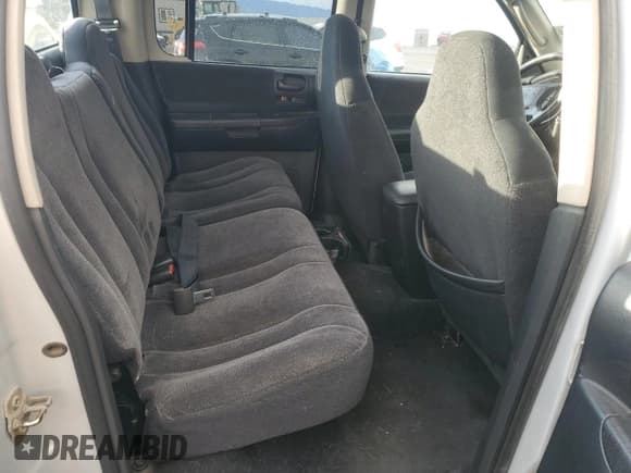 ✅ 2003 Dodge Dakota SLT • VIN: 1D7HG48N63S294766 • Lot: 81165574. Wystawiony na Copart z przebiegiem 159 132 mil. Bezpłatny archiwum sprzedaży aukcyjnych z USA i szczegółowy raport historii pojazdu na DreamBid. Zdjęcie 10.