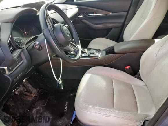 ✅ 2020 Mazda CX-30 Premium • VIN: 3MVDMAEMXLM125319 • Lot: 57896985. Wystawiony na Copart z przebiegiem 117 692 mil. Bezpłatny archiwum sprzedaży aukcyjnych z USA i szczegółowy raport historii pojazdu na DreamBid. Zdjęcie 7.