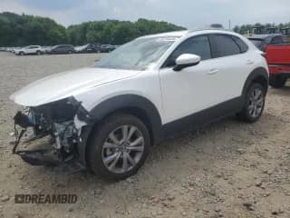 ✅ 2021 Mazda CX-30 Premium • VIN: 3MVDMBDM6MM216645 • Lot: 58310434. Wystawiony na Copart z przebiegiem Nie podano. Bezpłatny archiwum sprzedaży aukcyjnych z USA i szczegółowy raport historii pojazdu na DreamBid. Zdjęcie 1.