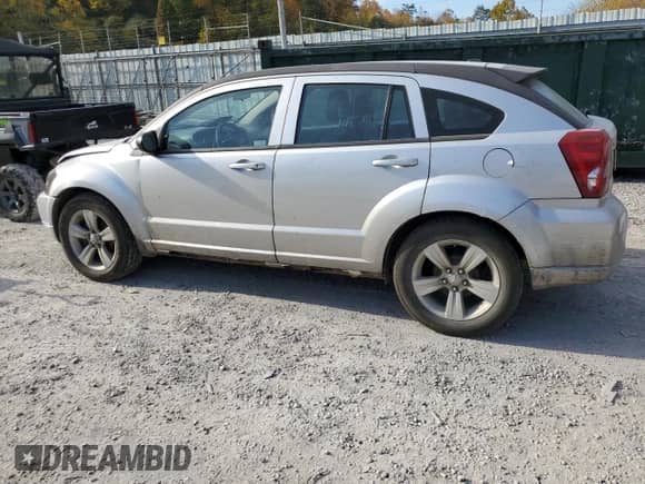 2010 Dodge Caliber SXT с VIN 1B3CB4HA6AD632590, выставлен на аукционе Copart как лот 75929634 с пробегом 213 273 миль миль и Списание • Salvage title. История ставок и продаж доступна на DreamBid. Изображение 2.