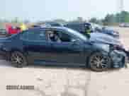 2021 Toyota Camry SE with VIN 4T1T11BKXMU042040, listed as a IAAI auction lot 42879951 with 35,130 mi miles and . Bid and sale history available at DreamBid. Image 13.