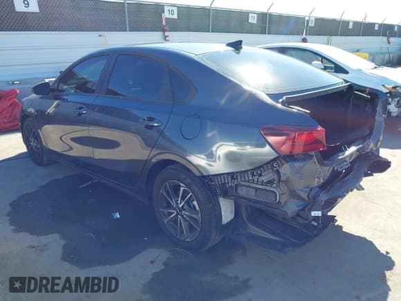 ✅ 2023 Kia Forte LXS • VIN: 3KPF24AD6PE652054 • Lot: 43551984. Listed on IAAI with 22,074 mi. Free auction sales archive from the USA and detailed vehicle history report at DreamBid. Image 3.