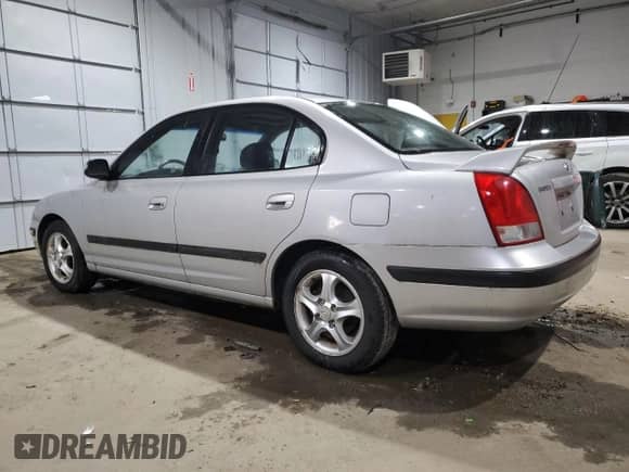 2003 Hyundai Elantra GLS с VIN KMHDN45D93U679555, выставлен на аукционе Copart как лот 85807064 с пробегом 42 032 миль миль и Чистый • Clean title. История ставок и продаж доступна на DreamBid. Изображение 2.