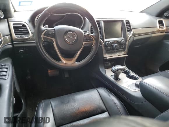 ✅ 2014 Jeep Grand Cherokee Overland • VIN: 1C4RJFCG6EC547604 • Lot: 55824944. Listed on Copart with 128,330 mi. Free auction sales archive from the USA and detailed vehicle history report at DreamBid. Image 8.