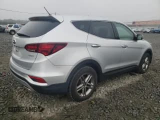 ✅ 2018 Hyundai Santa Fe 2.4L • VIN: 5XYZT3LB2JG571997 • Лот: 71226213. Опубликован ранее на Copart с пробегом Не указан. Бесплатный доступ к архиву аукционных продаж из США и подробный отчёт об истории автомобиля на DreamBid. Изображение 3.