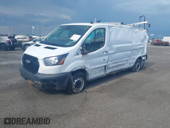 ✅ 2023 Ford Transit Cargo • VIN: 1FTYE1Y89PKA26468 • Lot: 42556373. Wystawiony na IAAI z przebiegiem 82 927 mil. Bezpłatny archiwum sprzedaży aukcyjnych z USA i szczegółowy raport historii pojazdu na DreamBid. Zdjęcie 2.