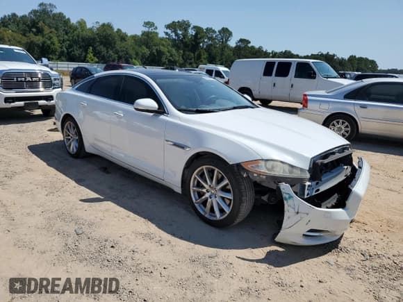 ✅ 2013 Jaguar XJ • VIN: SAJWA1C7XD8V55164 • Лот: 80382115. Опубликован ранее на Copart с пробегом 69 465 миль. Бесплатный доступ к архиву аукционных продаж из США и подробный отчёт об истории автомобиля на DreamBid. Изображение 4.