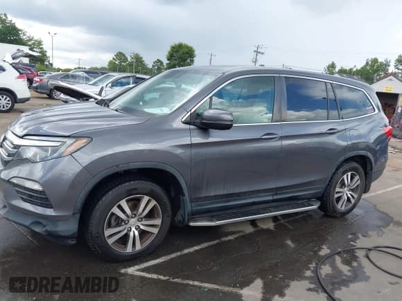✅ 2016 Honda Pilot EX-L • VIN: 5FNYF5H72GB022660 • Lot: 42738406. Listed on IAAI with 186,723 mi. Free auction sales archive from the USA and detailed vehicle history report at DreamBid. Image 14.