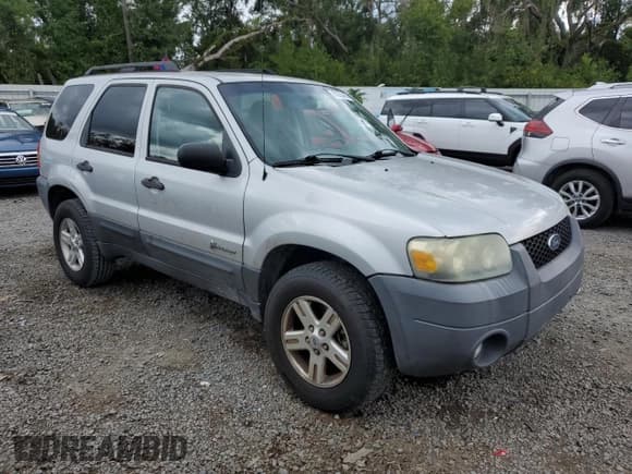 ✅ 2007 Ford Escape Hybrid • VIN: 1FMYU49H67KA35000 • Lot: 80333455. Listed on Copart with 152,640 mi. Free auction sales archive from the USA and detailed vehicle history report at DreamBid. Image 4.