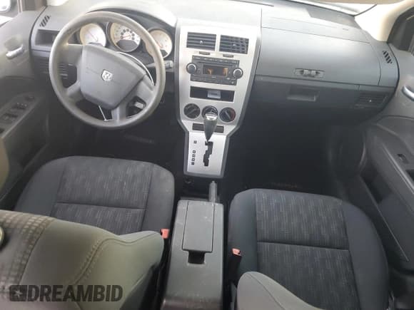 ✅ 2008 Dodge Caliber SE • VIN: 1B3HB28B78D701123 • Лот: 80334184. Опубликован ранее на Copart с пробегом 85 002 миль. Бесплатный доступ к архиву аукционных продаж из США и подробный отчёт об истории автомобиля на DreamBid. Изображение 8.