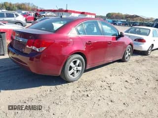 ✅ 2016 Chevrolet Cruze LT • VIN: 1G1PE5SB6G7164665 • Lot: 43521216. Listed on IAAI with 135,000 mi. Free auction sales archive from the USA and detailed vehicle history report at DreamBid. Image 4.