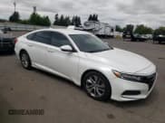 ✅ 2018 Honda Accord LX • VIN: 1HGCV1F14JA226348 • Lot: 62111935. Listed on Copart with 123,488 mi. Free auction sales archive from the USA and detailed vehicle history report at DreamBid. Image 4.
