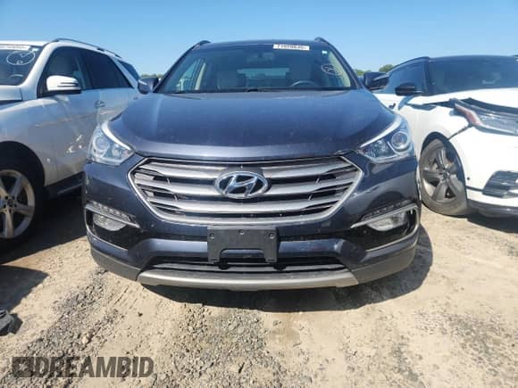 2017 Hyundai Santa Fe 2.0T z VIN 5XYZU3LAXHG379600, wystawiony jako Copart lot #71820035 z przebiegiem Nie podano mil oraz Czysty tytuł • Clean title. Historia ofert i sprzedaży dostępna na DreamBid. Obrazek 5.