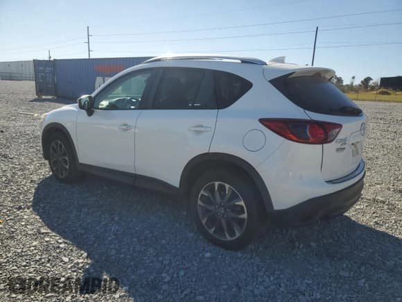 ✅ 2016 Mazda CX-5 Grand Touring • VIN: JM3KE4DY9G0790465 • Lot: 92579735. Wystawiony na Copart z przebiegiem 190 503 mil. Bezpłatny archiwum sprzedaży aukcyjnych z USA i szczegółowy raport historii pojazdu na DreamBid. Zdjęcie 2.