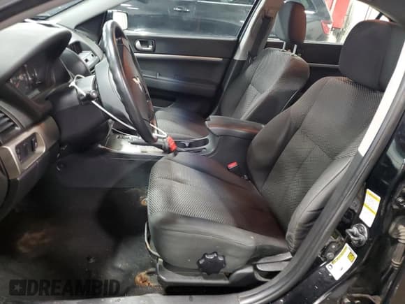 ✅ 2012 Mitsubishi Galant FE • VIN: 4A32B2FF0CE006749 • Lot: 56602695. Listed on Copart with 184,605 mi. Free auction sales archive from the USA and detailed vehicle history report at DreamBid. Image 7.