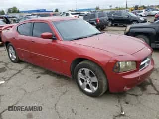 2009 Dodge Charger R/T с VIN 2B3LA53T79H581651, выставлен на аукционе Copart как лот 72608684 с пробегом 196 436 миль миль и Списание • Salvage title. История ставок и продаж доступна на DreamBid. Изображение 4.