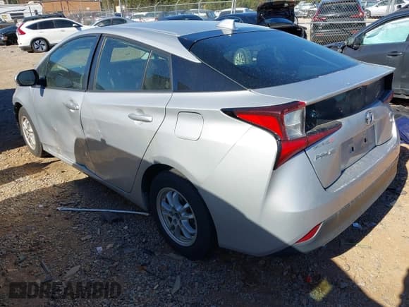 ✅ 2021 Toyota Prius L Eco • VIN: JTDKAMFU9M3143122 • Lot: 43486623. Listed on IAAI with 81,483 mi. Free auction sales archive from the USA and detailed vehicle history report at DreamBid. Image 3.