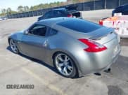 ✅ 2009 Nissan 370Z Touring • VIN: JN1AZ44E39M404491 • Lot: 43672244. Listed on IAAI with 118,427 mi. Free auction sales archive from the USA and detailed vehicle history report at DreamBid. Image 3.