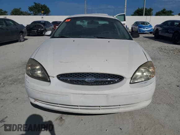 ✅ 2003 Ford Taurus SE Standard • VIN: 1FAFP53U23A194519 • Lot: 81839955. Wystawiony na Copart z przebiegiem 116 752 mil. Bezpłatny archiwum sprzedaży aukcyjnych z USA i szczegółowy raport historii pojazdu na DreamBid. Zdjęcie 5.