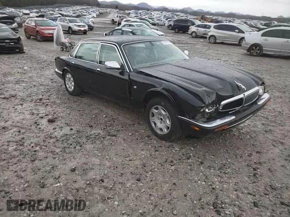 ✅ 2003 Jaguar XJ Vanden Plas • VIN: SAJDA24C33LF52131 • Лот: 84263554. Опубликован ранее на Copart с пробегом Не указан. Бесплатный доступ к архиву аукционных продаж из США и подробный отчёт об истории автомобиля на DreamBid. Изображение 10.