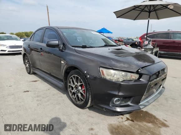 ✅ 2012 Mitsubishi Lancer Evolution MR • VIN: JA32W5FV4CU028953 • Lot: 87129155. Wystawiony na Copart z przebiegiem 75 943 mil. Bezpłatny archiwum sprzedaży aukcyjnych z USA i szczegółowy raport historii pojazdu na DreamBid. Zdjęcie 4.