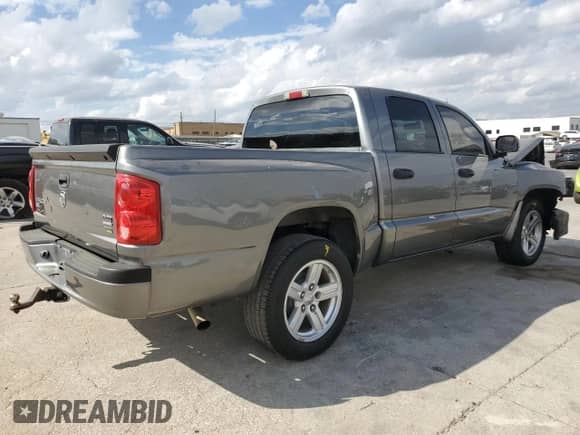 2008 Dodge Dakota SLT with VIN 1D7HE48N58S578824, listed as a Copart auction lot 78477474 with 64,557 mi miles and Salvage title. Bid and sale history available at DreamBid. Image 3.