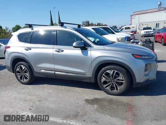 ✅ 2020 Hyundai Santa Fe Limited • VIN: 5NMS5CAA0LH186839 • Лот: 41981573. Опубликован ранее на IAAI с пробегом 68 751 миль. Бесплатный доступ к архиву аукционных продаж из США и подробный отчёт об истории автомобиля на DreamBid. Изображение 13.