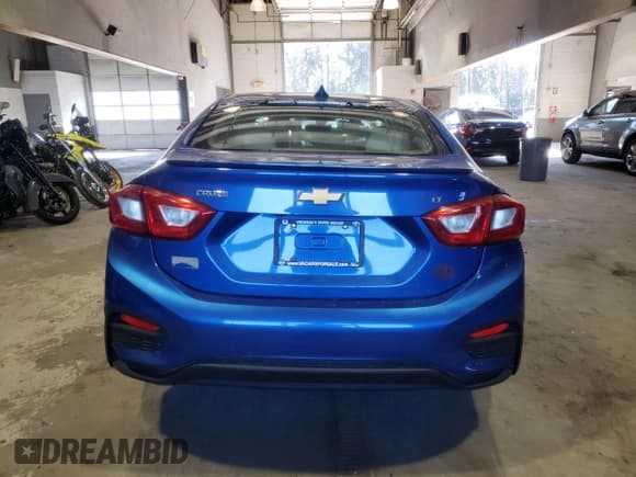 ✅ 2018 Chevrolet Cruze LT • VIN: 1G1BE5SM0J7145273 • Lot: 72986252. Listed on Copart with 91,253 mi. Free auction sales archive from the USA and detailed vehicle history report at DreamBid. Image 6.