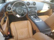 ✅ 2016 Jaguar XJ Portfolio • VIN: SAJWJ2GDXG8W03143 • Lot: 86467114. Listed on Copart with 42,923 mi. Free auction sales archive from the USA and detailed vehicle history report at DreamBid. Image 8.