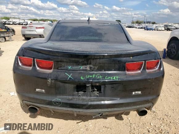2013 Chevrolet Camaro LS с VIN 2G1FA1E33D9140791, выставлен на аукционе Copart как лот 85364725 с пробегом 119 369 миль миль и Списание • Salvage title. История ставок и продаж доступна на DreamBid. Изображение 6.