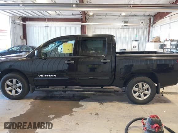 ✅ 2012 Nissan Titan SL • VIN: 1N6BA0EC0CN303180 • Лот: 43496527. Опубликован ранее на IAAI с пробегом 104 607 миль. Бесплатный доступ к архиву аукционных продаж из США и подробный отчёт об истории автомобиля на DreamBid. Изображение 15.