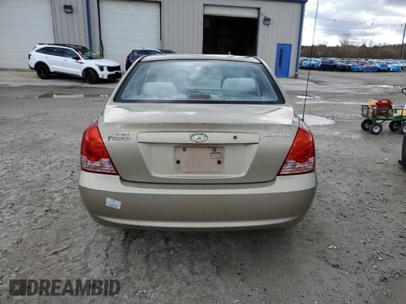 2003 Hyundai Elantra GLS z VIN KMHDN46D26U345516, wystawiony jako Copart lot #82101734 z przebiegiem 41 782 mil mil oraz Czysty tytuł • Clean title. Historia ofert i sprzedaży dostępna na DreamBid. Obrazek 6.