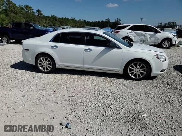 ✅ 2012 Chevrolet Malibu LTZ • VIN: 1G1ZG5E78CF277947 • Lot: 77191294. Listed on Copart with 232,217 mi. Free auction sales archive from the USA and detailed vehicle history report at DreamBid. Image 13.