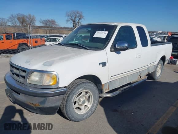 ✅ 1998 Ford F-150 • VIN: 2FTZX1760WCA98189 • Lot: 43675999. Listed on IAAI with 170,108 mi. Free auction sales archive from the USA and detailed vehicle history report at DreamBid. Image 2.
