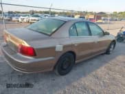 ✅ 2002 Mitsubishi Galant ES • VIN: 4A3AA46G82E159087 • Lot: 41862347. Listed on IAAI with Not provided. Free auction sales archive from the USA and detailed vehicle history report at DreamBid. Image 4.