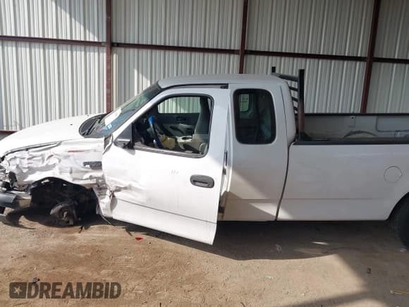 ✅ 2000 Ford F-150 XL • VIN: 1FTRX17W2YKB10745 • Lot: 43705083. Listed on IAAI with Not provided. Free auction sales archive from the USA and detailed vehicle history report at DreamBid. Image 14.