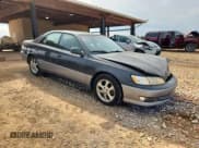 ✅ 2000 Lexus ES 300 • VIN: JT8BF28G5Y0277239 • Lot: 89916145. Wystawiony na Copart z przebiegiem 280 303 mil. Bezpłatny archiwum sprzedaży aukcyjnych z USA i szczegółowy raport historii pojazdu na DreamBid. Zdjęcie 4.