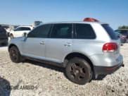 ✅ 2004 Volkswagen Touareg • VIN: WVGGH77L04D054425 • Лот: 69970584. Опубликован ранее на Copart с пробегом Не указан. Бесплатный доступ к архиву аукционных продаж из США и подробный отчёт об истории автомобиля на DreamBid. Изображение 2.
