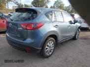 ✅ 2016 Mazda CX-5 Sport • VIN: JM3KE4BY4G0660953 • Лот: 43450266. Опубликован ранее на IAAI с пробегом 140 627 миль. Бесплатный доступ к архиву аукционных продаж из США и подробный отчёт об истории автомобиля на DreamBid. Изображение 4.