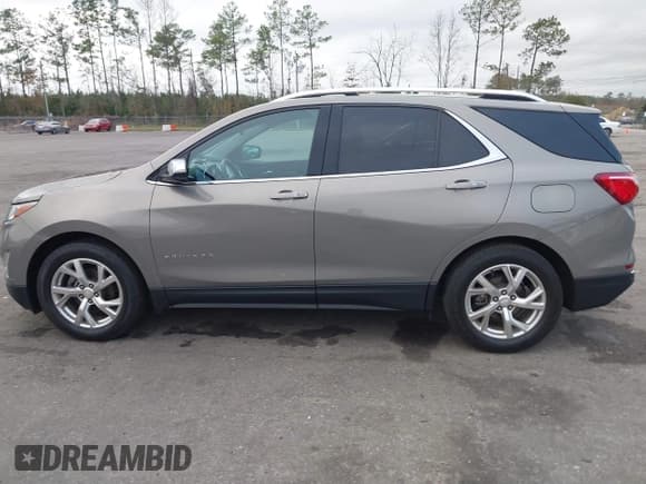 ✅ 2018 Chevrolet Equinox Premier • VIN: 3GNAXMEV7JS547991 • Лот: 41208640. Опубликован ранее на IAAI с пробегом 98 879 миль. Бесплатный доступ к архиву аукционных продаж из США и подробный отчёт об истории автомобиля на DreamBid. Изображение 14.