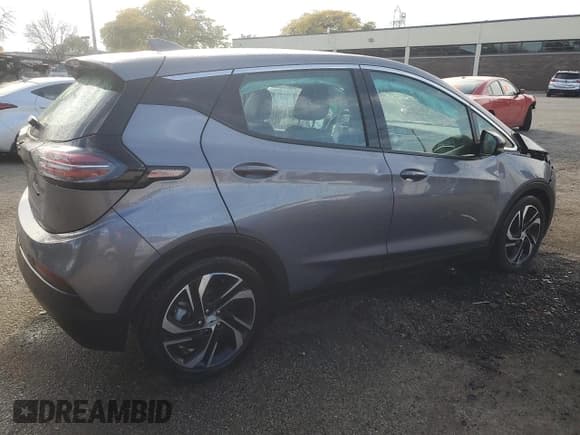 ✅ 2023 Chevrolet Bolt EV 2LT • VIN: 1G1FX6S07P4139124 • Lot: 90520815. Listed on Copart with 58,090 mi. Free auction sales archive from the USA and detailed vehicle history report at DreamBid. Image 3.