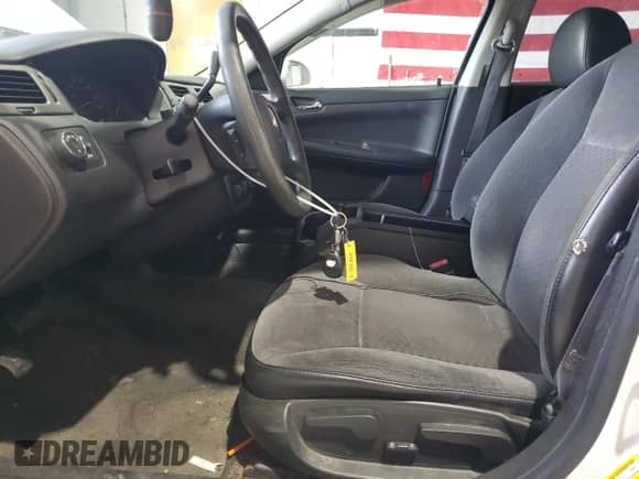 2013 Chevrolet Impala Police with VIN 2G1WD5E36D1267533, listed as a Copart auction lot 48659915 with 72,716 mi miles and Salvage title. Bid and sale history available at DreamBid. Image 7.