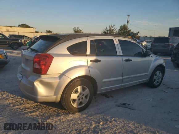 ✅ 2008 Dodge Caliber SE • VIN: 1B3HB28B78D701123 • Лот: 80334184. Опубликован ранее на Copart с пробегом 85 002 миль. Бесплатный доступ к архиву аукционных продаж из США и подробный отчёт об истории автомобиля на DreamBid. Изображение 3.