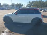 ✅ 2016 MINI Hardtop John Cooper Works • VIN: WMWXM9C52GT997913 • Lot: 43705175. Listed on IAAI with 148,898 mi. Free auction sales archive from the USA and detailed vehicle history report at DreamBid. Image 14.